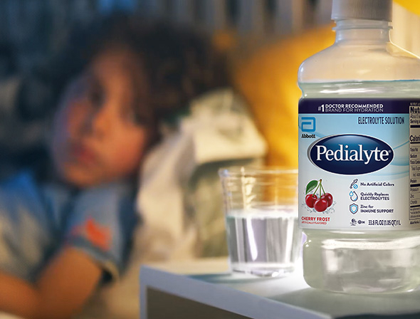 Man mixing Pedialyte in Water