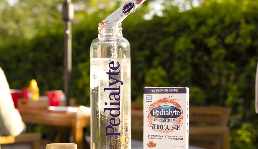 Man mixing Pedialyte in Water