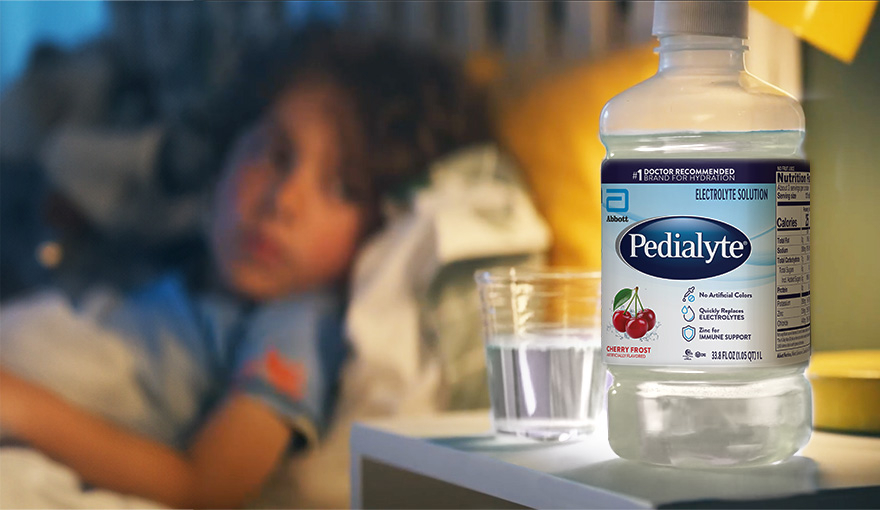 Man mixing Pedialyte in Water